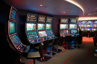a casino room filled with lots of slot machines